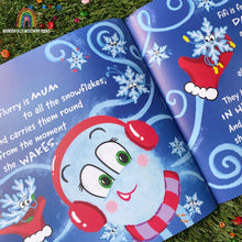 Load image into Gallery viewer, Open children&#39;s book with a snow-themed illustration on a grassy background